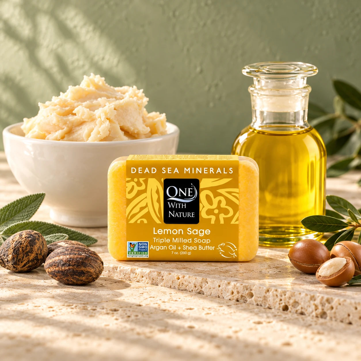 One With Nature Lemon Sage soap in a warm stone setting